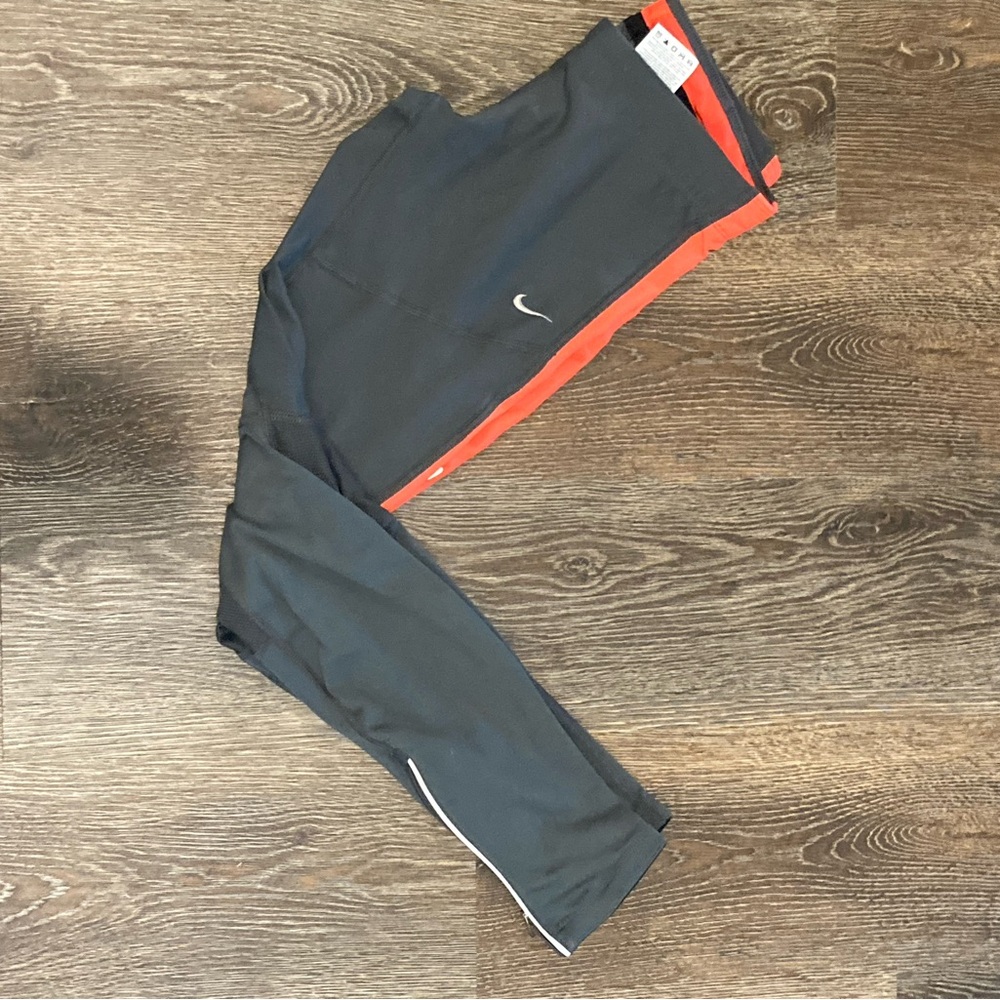 Nike Black Leggings with Orange Accents - Picture 2 of 4
